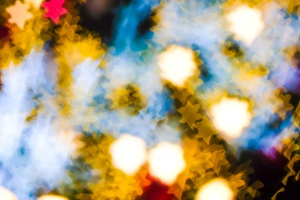 五颜六色的脱焦圣诞博克抽象的节日背景 — 图库照片