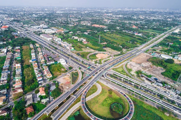 Above transport intersection rural road with car green tree, Green transport concept