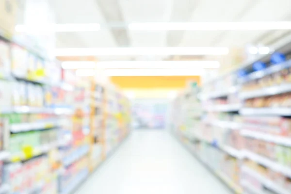 Negozio di supermercati offuscati Bokeh con varie merci sullo scaffale — Foto Stock