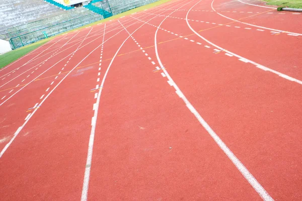 Red running track texture sport background
