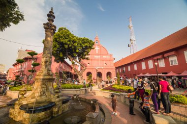 Malacca,Malaysia - October 24,2014: Scenic view of the Christ Church Malacca and Dutch Square, Tourist can seen exploring around. It has been listed as UNESCO World Heritage Site since 7/7/2008