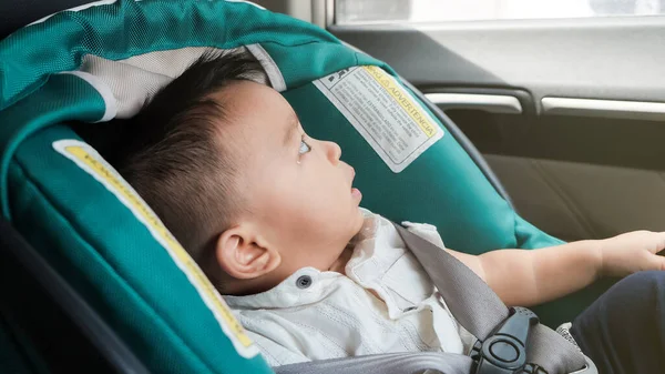 Adorable Baby Boy Lying Car Seat Safety Belt While Travel — Stock Photo, Image