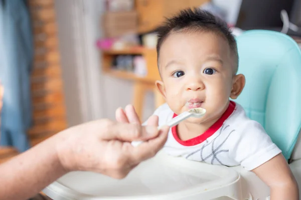 Asian Baby Child Boy Sitting Baby Chair Try Eating Blend — Stockfoto