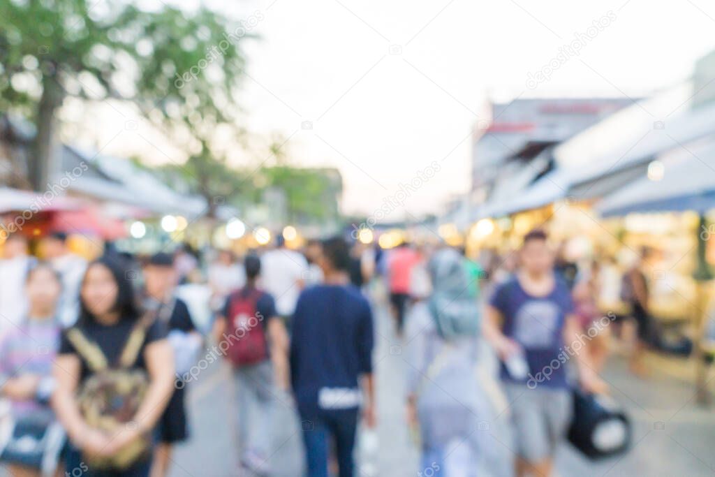 Blurred people walking in Chatuchak JJ outdoor market for shopping