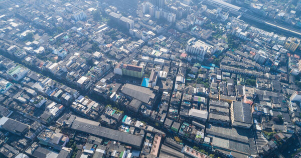 Bangkok building of house and flat with traffic road aerial view