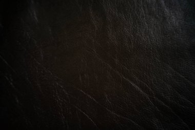 Hakiki siyah sebze bronzlaşmış deri kaplama arka plan, sığır derisi.