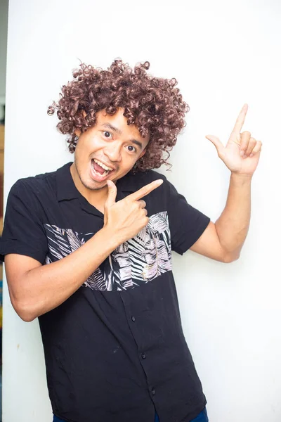 Smart funny afro hair men posting hand sign on white background business concept