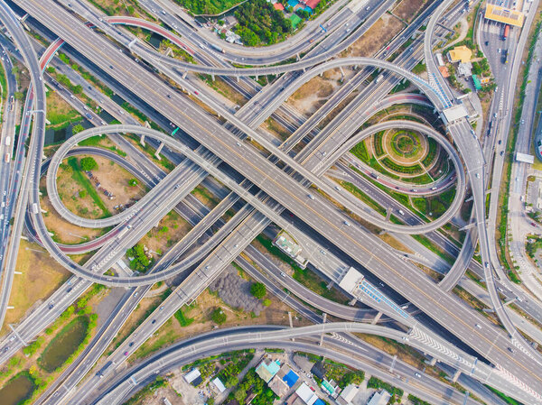 Aerial view elevated city road junction and interchange overpass at  day light Bangkok Thailand