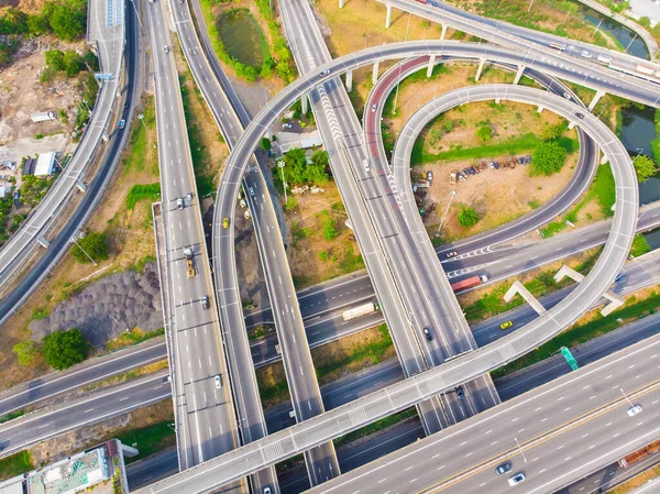 Aerial view elevated city road junction and interchange overpass at  day light Bangkok Thailand