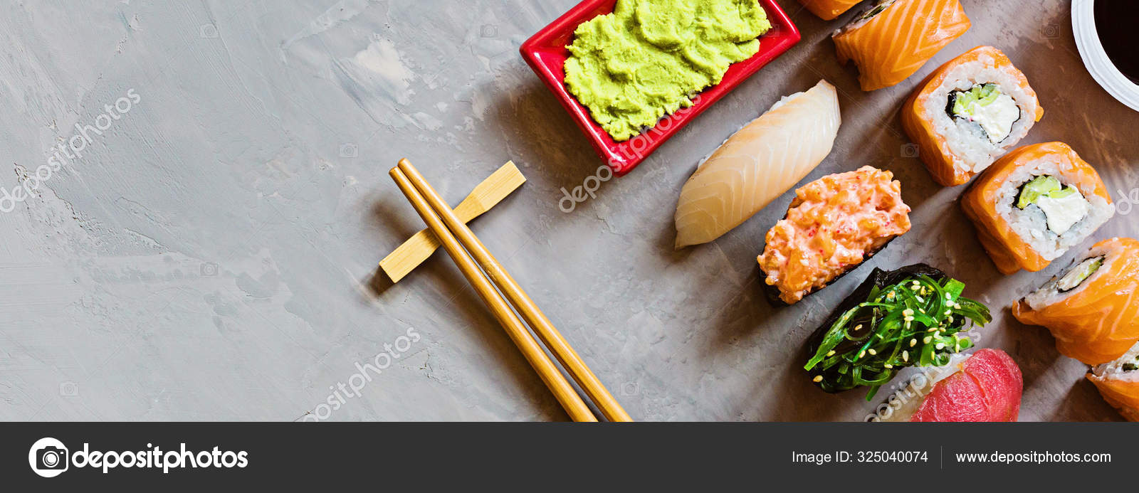 Download Top View On Traditional Japanese Empty With Sushi Ginger Soy Sauce Wasabi On Concrete Gray Background Mock Up Online Food Delivery Concept Stock Photo Image By C Alinabuphoto 325040074