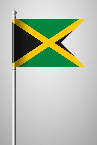 Bandera de Jamaica. Bandera Nacional en asta de bandera — Archivo Imágenes Vectoriales