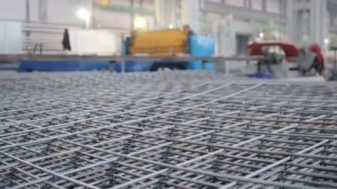 large metal rebar mold pile lies in production factory shop