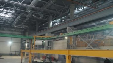 white cable transporter moves on special green rail support