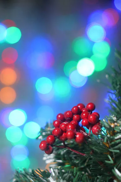 Christmas decorations on the background of a blinking garland. — Stock Photo, Image