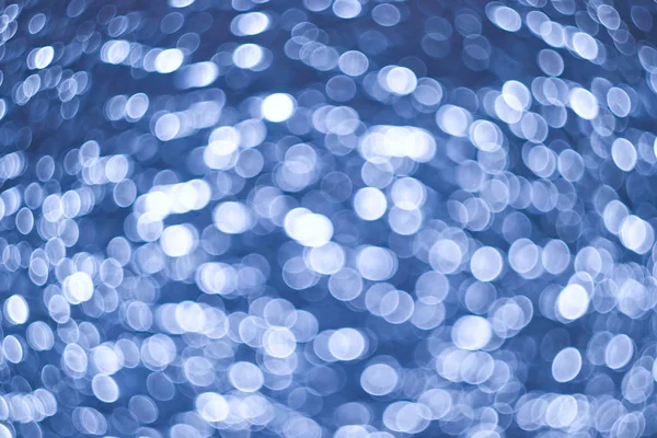 Abstrakter Hintergrund aus zerknüllter Folie mit beweglichem Licht — Stockfoto