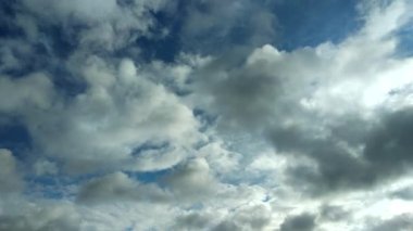 Clouds flying through the winter sky. Snow-carrying clouds driven by the wind through the cold winter sky.