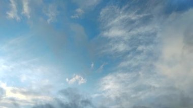 Clouds flying through the winter sky. Snow-carrying clouds driven by the wind through the cold winter sky.