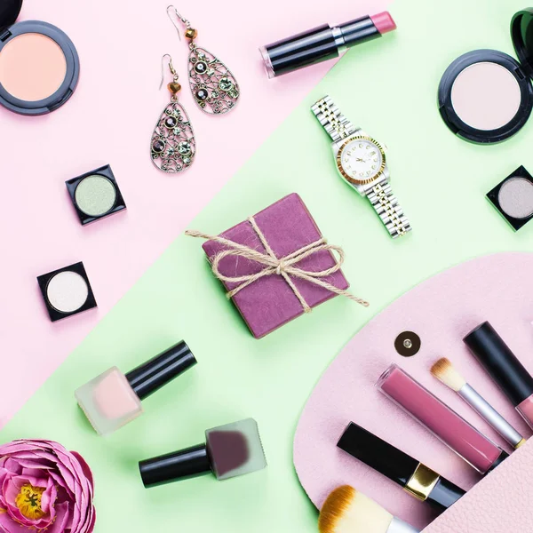Beauty products and fashion accessories flat lay on pastel background
