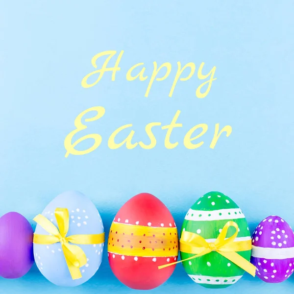 Happy Easter greeting card with colorful Easter eggs in background.
