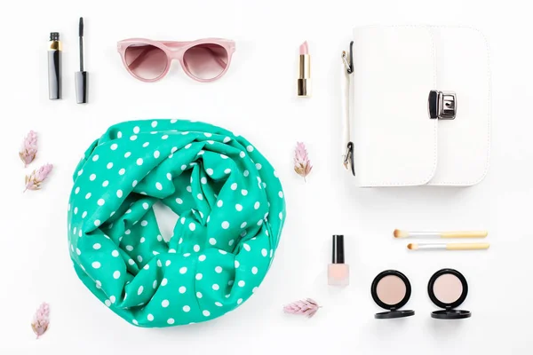 Woman fashion and beauty accessories - purse, sunglasses, scarf, cosmetics. Spring concept fashion collection.