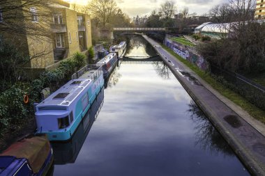 British water canal with house boats clipart