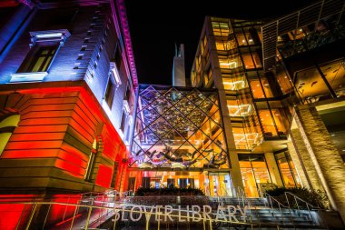 The Slover Library at night, in downtown Norfolk, Virginia. clipart