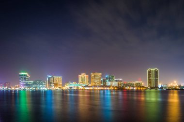The skyline of Norfolk at night, seen from the waterfront in Por clipart