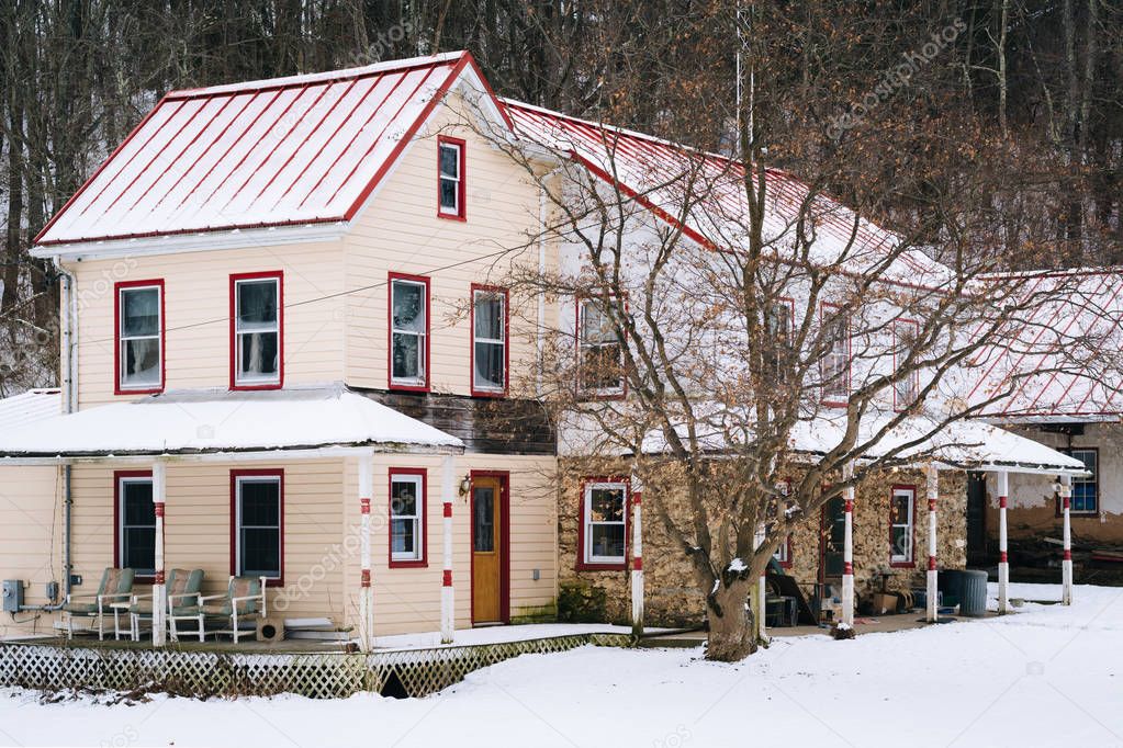 House on a snowy winter day, in a rural area of Carroll County, 