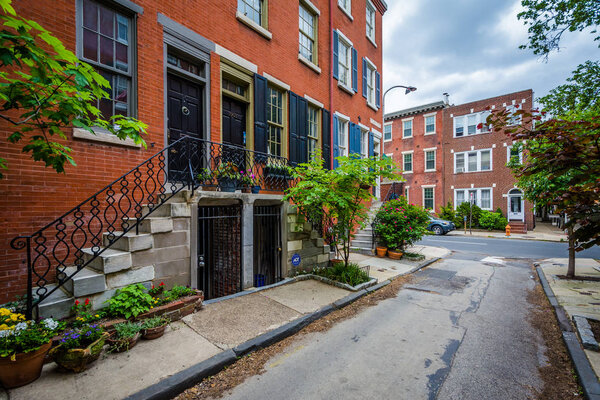 Historic brick row houses along Waverly Street, in Philadelphia, Pennsylvania.