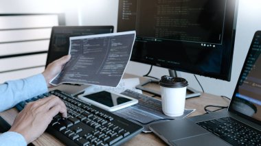 Programmer working On Computer In IT Office Typing Data Coding i