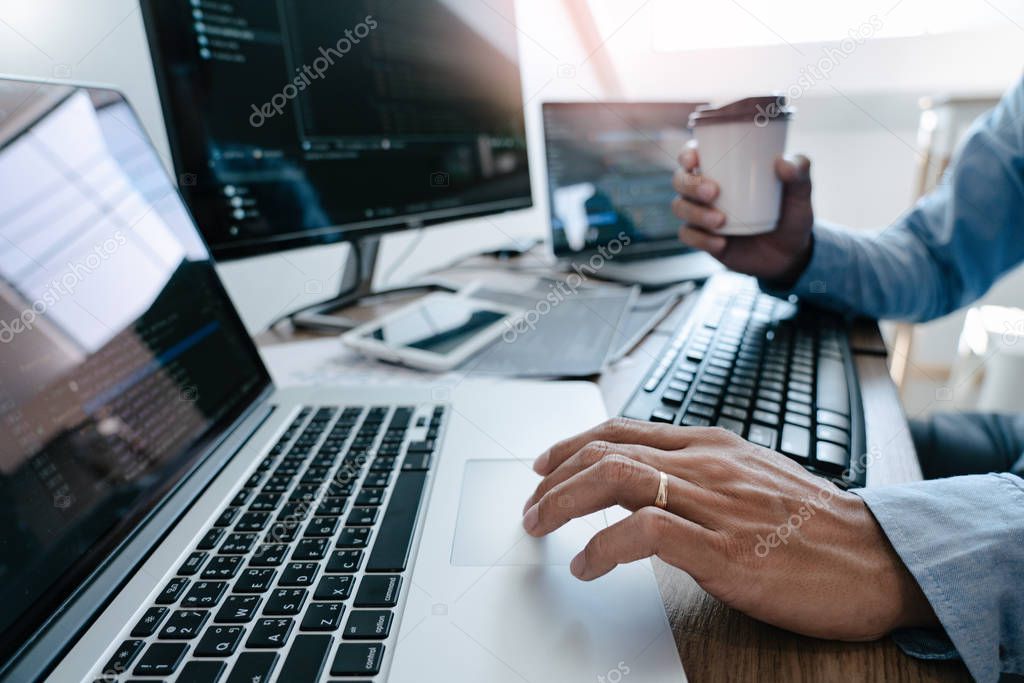 Programmer working On Computer In IT Office Typing Data Coding i