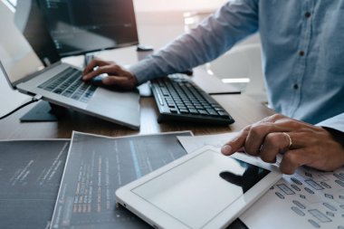 Programmer Typing Code on desktop computer, Developing programmi