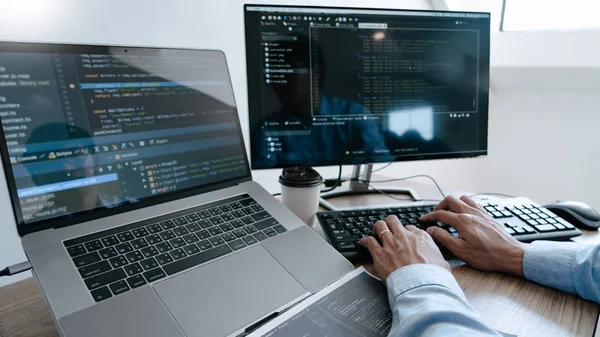 Programmer Typing Code on desktop computer, Developing programmi — Stok fotoğraf