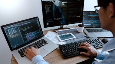 Programmer working On Computer In IT Office Typing Data Coding i