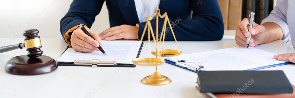 Women lawyer discussing with clients in courtroom. justice and law ,attorney, court judge, meeting concept.