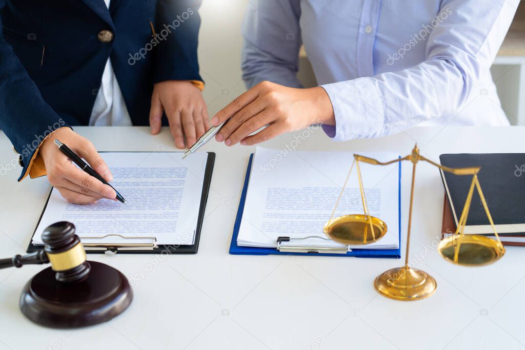 Women lawyer discussing with clients in courtroom. justice and law ,attorney, court judge, meeting concept.