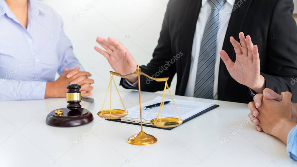 Judge gavel deciding on agreement prepared marriage divorce and Angry couple arguing telling their problems settlement, legal separation concept 