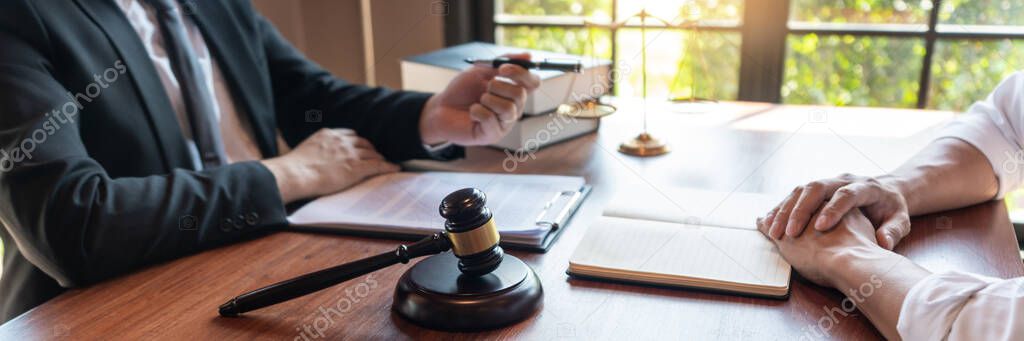 Male Notary lawyer or judge consult or discussing contract papers with Businessman client in office, Law and Legal services concept.