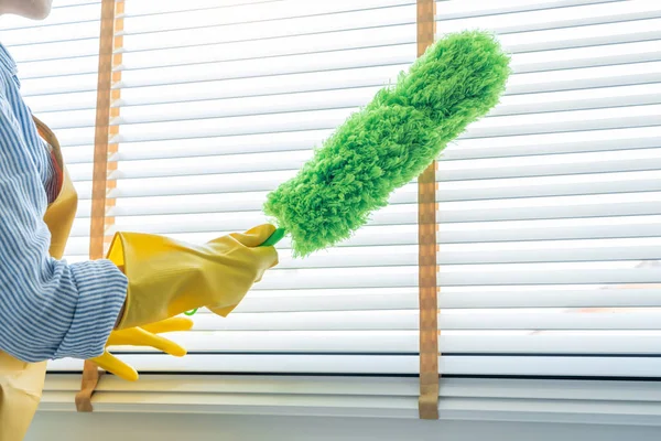Young Female Spring Cleaning House Interior Holding Duster Wiping Dust — Stock Photo, Image