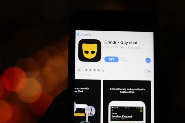 Los Angeles, Califórnia, EUA - 28 de novembro de 2019: Logotipo do aplicativo Grindr na tela do celular com fundo embaçado, Editorial Ilustrativo — Fotografia de Stock