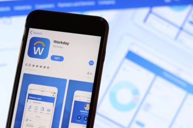 Ekranda Workday simgesi olan telefon laptopta bulanık web sitesini kapatın. Los Angeles, California, Usa - 30 Kasım 2019, Illustrative Editorial