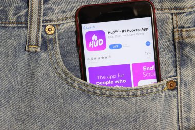Los Angeles, California, Usa - 5 Aralık 2019: Hud Hookup uygulama simgesi telefon ekranında kot pantolonun cebinde. Açık kot arka planlı İphone 'daki Uygulama Mağazası logosu, Resimli Editör