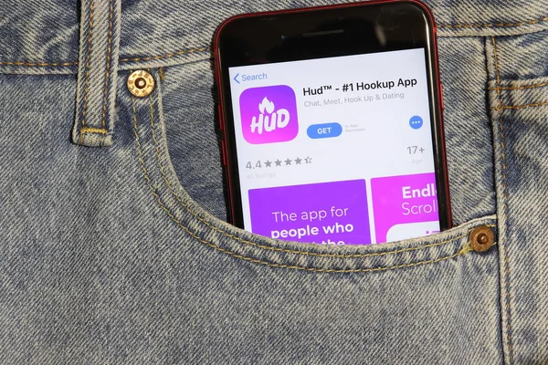 Лос-Анджелес, Калифорния, США - 5 декабря 2019 года: иконка приложения Hud Happy up на экране телефона в синем кармане джинсов. Логотип App Store на Iphone с легким джинсовым фоном, иллюстративная редакция — стоковое фото