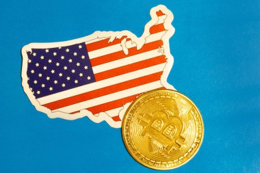 USA Flag with Bitcoin flat lay for illustration. Cryptocurrency btc law concept