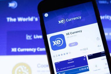 Los Angeles, California, Usa - 12 Şubat 2020: Xe simgesiyle cep telefonu bilgisayarda web sitesini kapatın. Xe Para Birimi sitesi ile bulanık arkaplan, İllüstrasyon Editörü