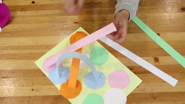 Little Boy Plays Developmental Puzzle Game His Hands Top View — Stock Video