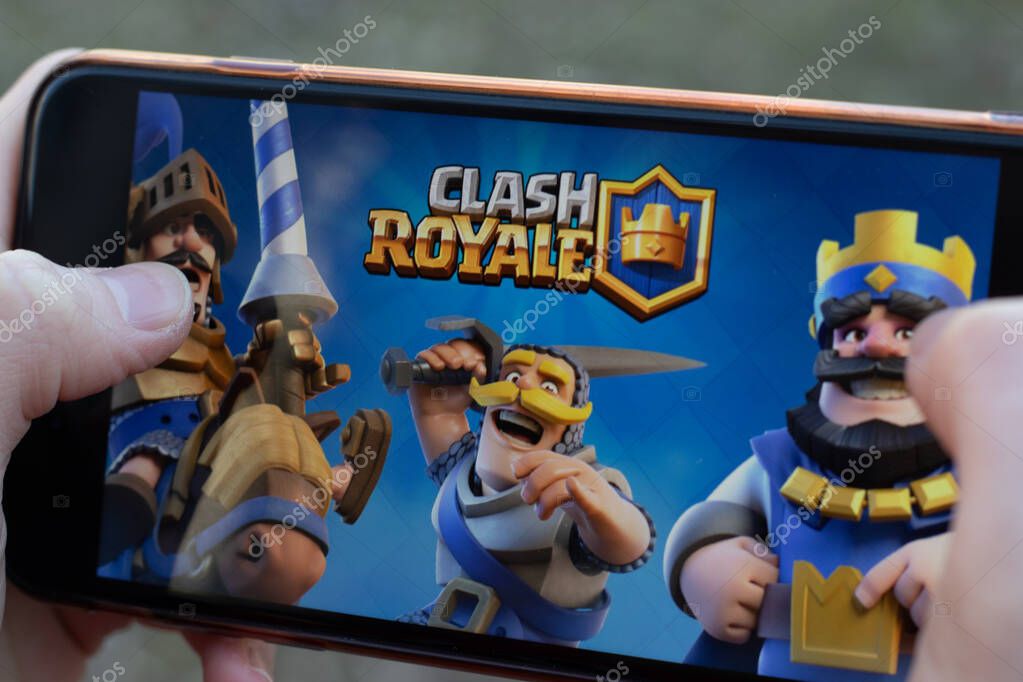 New York, USA - 1 May 2020: Clash Royale mobile game app logo close-up on phone screen, Illustrative Editorial.