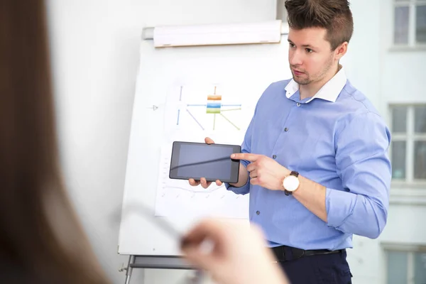 Businessman Showing Digital Tablet To Female Colleague — Stock Photo, Image