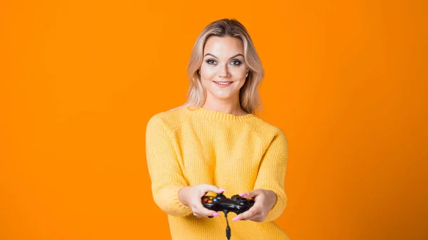 Girl gamer. Play computer games, a modern hobby and sport.