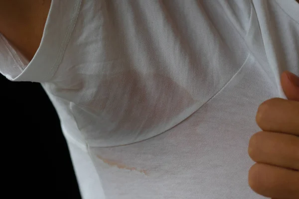 Sweat stain on his t-shirt. Excessive sweating stains clothes, armpit — Stock Photo, Image